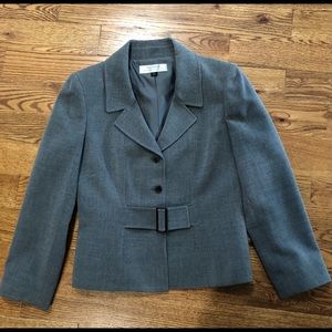 Tahari Gray skirt and jacket perfect condition. Skirt has great back with pleat
